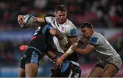 4 March 2022; Stuart McCloskey, supported by Ulster teammate Ben Moxham, is tackled by Willis Halaholo, left, and Rey Lee-Lo of Cardiff during the United Rugby Championship match between Ulster and Cardiff at Kingspan Stadium in Belfast. Photo by Ramsey Cardy/Sportsfile