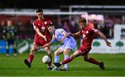 4 March 2022; Brandon Kavanagh of Derry City is tackled by Aodh Dervin of Shelbourne during the SSE Airtricity League Premier Division match between Shelbourne and Derry City at Tolka Park in Dublin. Photo by Eóin Noonan/Sportsfile