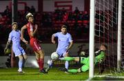 4 March 2022; Patrick McEleney of Derry City scores his side's first goal despite the efforts of Shelbourne goalkeeper Lewis Webb during the SSE Airtricity League Premier Division match between Shelbourne and Derry City at Tolka Park in Dublin. Photo by Eóin Noonan/Sportsfile