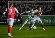 4 March 2022; Rory Gaffney of Shamrock Rovers in action against Tom Grivosti of St Patrick's Athletic during the SSE Airtricity League Premier Division match between St Patrick's Athletic and Shamrock Rovers at Richmond Park in Dublin. Photo by Seb Daly/Sportsfile