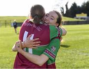 5 March 2022; Eoghan Rua players Eve Lundy, right, and Katie Mullan celebrate after the 2021 AIB Junior Club Camogie A Championship Final match between Clanmaurice, Kerry, and Eoghan Rua, Derry, at O'Raghallaigh's GAA club in Drogheda, Louth. Photo by Piaras Ó Mídheach/Sportsfile