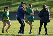 5 March 2022; Emily Mulhall of Knockananna celebrates with her manager Tom Byrne after their side's victory in the 2021 AIB Junior Club Camogie B Championship Final match between Derrylaughan, Tyrone, and Knockananna, Wicklow, at O'Raghallaigh's GAA club in Drogheda, Louth. Photo by Piaras Ó Mídheach/Sportsfile