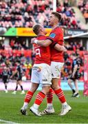5 March 2022; Craig Casey of Munster, left, celebrates with teammate Jack Crowley after scoring their side's first try during the United Rugby Championship match between Munster and Dragons at Thomond Park in Limerick. Photo by Seb Daly/Sportsfile