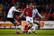 5 March 2022; Karl O'Sullivan of Sligo Rovers in action against Sam Bone, right, and Daniel Kelly of Dundalk during the SSE Airtricity League Premier Division match between Sligo Rovers and Dundalk at The Showgrounds in Sligo. Photo by Ben McShane/Sportsfile