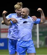 25 February 2022; Mark Coyle of Shelbourne celebrates with Shelbourne teammate Aaron O’Driscoll, left, after scoring their side's second goal during the SSE Airtricity League Premier Division match between Drogheda United and Shelbourne at Head in the Game Park in Drogheda, Louth. Photo by Ramsey Cardy/Sportsfile