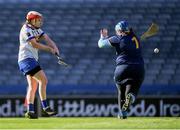 6 March 2022; Siobhán Flannery of St Rynagh's shoots to score her side's first goal, past Salthill Knocknacarra goalkeeper Vicky Flanagan, during the 2021 AIB All-Ireland Intermediate Camogie Club Championship Final match between Salthill Knocknacarra, Galway, and St Rynagh's, Offaly, at Croke Park in Dublin. Photo by Piaras Ó Mídheach/Sportsfile