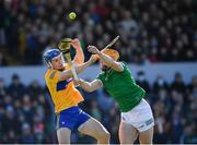 6 March 2022; Adam English of Limerick is tackled by Rory Hayes of Clare during the Allianz Hurling League Division 1 Group A match between Clare and Limerick at Cusack Park in Ennis, Clare. Photo by Ray McManus/Sportsfile