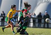 6 March 2022; Sinead Walsh of Mayo scores her side's first goal despite the efforts of Shelly Twohig of Donegal, left, and Donegal goalkeeper Roisin McCafferty during the Lidl Ladies Football National League Division Division 1A, Round 3 match between Mayo and Donegal at Connacht GAA Centre of Excellence in Bekan, Mayo. Photo by Sam Barnes/Sportsfile