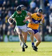 6 March 2022; Tony Kelly of Clare is tackled by Ronan Connolly of Limerick during the Allianz Hurling League Division 1 Group A match between Clare and Limerick at Cusack Park in Ennis, Clare. Photo by Ray McManus/Sportsfile