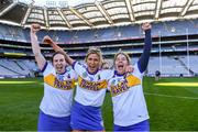 6 March 2022; Siobhán Flannery, Róisín Egan and Louise Flannery of St Rynagh's celebrate after the 2021 AIB All-Ireland Intermediate Camogie Club Championship Final match between Salthill Knocknacarra, Galway and St Rynagh's, Offaly at Croke Park in Dublin. Photo by Piaras Ó Mídheach/Sportsfile