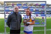 6 March 2022; Tom Burke, AIB Business manager Galway and Mayo, presents the AIB player of the match award to Kate Kenny of St Rynagh's after the 2021 AIB All-Ireland Intermediate Camogie Club Championship Final match between Salthill Knocknacarra, Galway and St Rynagh's, Offaly at Croke Park in Dublin. Photo by Piaras Ó Mídheach/Sportsfile
