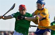 6 March 2022; Barry Nash of Limerick is tackled by David Fitzgerald of Clare during the Allianz Hurling League Division 1 Group A match between Clare and Limerick at Cusack Park in Ennis, Clare. Photo by Ray McManus/Sportsfile