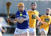 6 March 2022; James Keyes of Laois in action against Ryan McGarry of Antrim during the Allianz Hurling League Division 1 Group B match between Laois and Antrim at MW Hire O'Moore Park in Portlaoise, Laois. Photo by Michael P Ryan/Sportsfile
