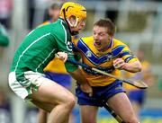 18 April 2004; Jamesie O'Connor of Clare in action against Niall Moran, Clare. Allianz Hurling League 2004, Division 1, Group 1, Limerick v Clare, Gaelic Grounds, Limerick. Picture credit; Brendan Moran / SPORTSFILE *EDI*
