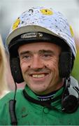 31 July 2013; Jockey Ruby Walsh celebrates in the winners enclosure after victory in the €100,000 Tote Pick Six Guarantee Maiden Hurdle on Blackmail. Galway Racing Festival, Ballybrit, Co. Galway.