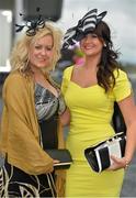1 August 2013; Katerina Gillen, from Greencastle, left, and Ciara Cush, from Cookstown, both Co. Tyrone, enjoying Ladies Day at the Galway Racing Festival, Ballybrit, Co. Galway. Picture credit: Barry Cregg / SPORTSFILE