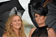 1 August 2013; Helen Hehir, left, and Emma O'Loughlin, both from Inagh, Co. Clare, enjoying Ladies Day at the Galway Racing Festival, Ballybrit, Co. Galway. Picture credit: Barry Cregg / SPORTSFILE