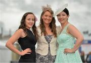 1 August 2013; Karina Walton, centre, from Kilkenny City, with Grace and Lisa Kenneally, right, both from Kanturk, Co. Cork, enjoying Ladies Day at the Galway Racing Festival, Ballybrit, Co. Galway. Picture credit: Barry Cregg / SPORTSFILE