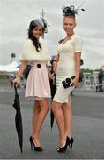 1 August 2013; Monica Sadawska, left, and Elizabeth Dubrovska, both from Claregalway, Co. Galway, enjoying Ladies Day at the Galway Racing Festival, Ballybrit, Co. Galway. Picture credit: Barry Cregg / SPORTSFILE