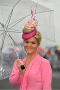 1 August 2013; Paula Clancy, from Inverin, Co. Galway, enjoying Ladies Day at the Galway Racing Festival, Ballybrit, Co. Galway. Picture credit: Barry Cregg / SPORTSFILE