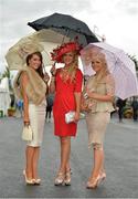 1 August 2013; Yvette Byrne, left, Michelle Cullen, centre, and Brianna Doyle, all from Tullow, Co. Carlow, enjoying Ladies Day at the Galway Racing Festival, Ballybrit, Co. Galway. Picture credit: Barry Cregg / SPORTSFILE