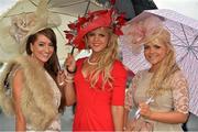 1 August 2013; Yvette Byrne, left, Michelle Cullen, centre, and Brianna Doyle, all from Tullow, Co. Carlow, enjoying Ladies Day at the Galway Racing Festival, Ballybrit, Co. Galway. Picture credit: Barry Cregg / SPORTSFILE