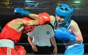 2 August 2013; Aaron McKenna, right, Ireland, exchanges punches with Artem Bulatov, Ukraine, during their 46kg bout. 2013 EUBC European Schoolboys Boxing Championships Semi-Finals, Citywest Hotel, Saggart, Co. Dublin. Picture credit: Barry Cregg / SPORTSFILE