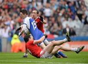 3 August 2013; Conor McManus, Monaghan, is tackled by Sean Cavanagh, Tyrone, assisted by Colm Cavanagh. GAA Football All-Ireland Senior Championship, Quarter-Final, Monaghan v Tyrone, Croke Park, Dublin. Picture credit: Oliver McVeigh / SPORTSFILE