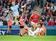 3 August 2013; Dublin's Jack McCaffrey, Cork goalkeeper Alan Quirke and corner back Thomas Clancy watch the flight of the ball as it makes its way to the Cork net for the only goal of the game. GAA Football All-Ireland Senior Championship, Quarter-Final, Dublin v Cork, Croke Park, Dublin. Picture credit: Ray McManus / SPORTSFILE