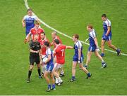 3 August 2013; Referee Cormac Reilly speaks to players after an incident before half time, which resulted in Martin Penrose, Tyrone, being sent off. GAA Football All-Ireland Senior Championship, Quarter-Final, Monaghan v Tyrone, Croke Park, Dublin. Picture credit: Dáire Brennan / SPORTSFILE