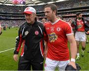 3 August 2013; Tyrone manager Mickey Harte comes off the field with Martin Penrose after the game. GAA Football All-Ireland Senior Championship, Quarter-Final, Monaghan v Tyrone, Croke Park, Dublin. Picture credit: Oliver McVeigh / SPORTSFILE