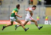 4 August 2013; Lee Brennan, Tyrone, in action against Pádraig Ó Conchúir, Kerry. Electric Ireland GAA Football All-Ireland Minor Championship, Quarter-Final, Kerry v Tyrone, Croke Park, Dublin. Photo by Sportsfile