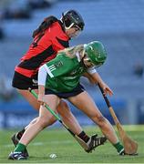 6 March 2022; Una Leacy of Oulart the Ballagh in action against Laura Ward of Sarsfields during the 2021 AIB All-Ireland Senior Camogie Club Championship Final between Oulart the Ballagh, Wexford, and Sarsfields, Galway, at Croke Park in Dublin.  Photo by Piaras Ó Mídheach/Sportsfile
