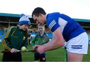 6 March 2022; Willie Dunphy of Laois signs autographs for young supporters after the Allianz Hurling League Division 1 Group B match between Laois and Antrim at MW Hire O'Moore Park in Portlaoise, Laois. Photo by Michael P Ryan/Sportsfile