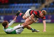 7 March 2022; Tom Geoghegan of Wesley College is tackled by Stephen McMahon of Gonzaga College during the Bank of Ireland Leinster Rugby Schools Senior Cup 2nd Round match between Gonzaga College and Wesley College at Energia Park in Dublin. Photo by Eóin Noonan/Sportsfile