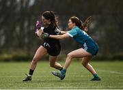 8 March 2022; Caoimhe Redmond of TUS Midwest in action against Leah Shekleton of TU Dublin during the Yoplait LGFA Lagan Cup Final match between TUS Midwest, Limerick, and TU Dublin, at DCU Dóchas Éireann Astro Pitch in Dublin. Photo by David Fitzgerald/Sportsfile