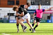 8 March 2022; Callum Bolton of Newbridge College is tackled by Michael Carmody of Belvedere College during the Bank of Ireland Leinster Rugby Schools Senior Cup 2nd Round match between Newbridge College and Belvedere College at Energia Park in Dublin. Photo by Sam Barnes/Sportsfile