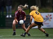 8 March 2022; Kia Gerraghty of Marino in action against Loren Doyle of DCU during the Yoplait LGFA Donaghy Cup Final match between DCU Dóchas Éireann, Dublin, and Marino Institute of Education, Dublin, at DCU Dóchas Éireann Astro Pitch in Dublin. Photo by David Fitzgerald/Sportsfile