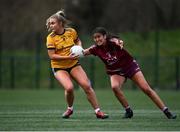 8 March 2022; Aoife Kilcommins of DCU in action against Chloe Dolan of Marino during the Yoplait LGFA Donaghy Cup Final match between DCU Dóchas Éireann, Dublin, and Marino Institute of Education, Dublin, at DCU Dóchas Éireann Astro Pitch in Dublin. Photo by David Fitzgerald/Sportsfile