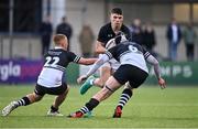 8 March 2022; Andre Ryan of Belvedere College in action against Tom Bohan, left, and Kieran Kelly of Newbridge College during the Bank of Ireland Leinster Rugby Schools Senior Cup 2nd Round match between Newbridge College and Belvedere College at Energia Park in Dublin. Photo by Sam Barnes/Sportsfile