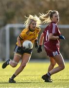 8 March 2022; Loren Doyle of DCU in action against Kia Geraghty of Marino during the Yoplait LGFA Donaghy Cup Final match between DCU Dóchas Éireann, Dublin, and Marino Institute of Education, Dublin, at DCU Dóchas Éireann Astro Pitch in Dublin. Photo by David Fitzgerald/Sportsfile