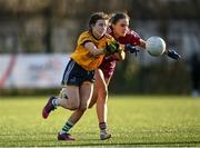 8 March 2022; Edel Hayes of DCU in action against Aoife Coffey of Marino during the Yoplait LGFA Donaghy Cup Final match between DCU Dóchas Éireann, Dublin, and Marino Institute of Education, Dublin, at DCU Dóchas Éireann Astro Pitch in Dublin. Photo by David Fitzgerald/Sportsfile