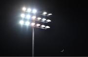 5 March 2022; The moon is seen beyond a floodlight in The Showgrounds during the SSE Airtricity League Premier Division match between Sligo Rovers and Dundalk at The Showgrounds in Sligo. Photo by Ben McShane/Sportsfile