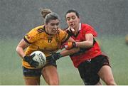 11 March 2022; Maria Reilly of DCU Dóchas Éireann in action against Jen O'Gorman of UCC during the Yoplait LGFA O'Connor Cup Semi-Final match between DCU Dóchas Éireann, Dublin and UCC, Cork at DCU in Dublin. Photo by Eóin Noonan/Sportsfile