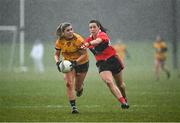 11 March 2022; Maria Reilly of DCU Dóchas Éireann in action against Jen O'Gorman of UCC during the Yoplait LGFA O'Connor Cup Semi-Final match between DCU Dóchas Éireann, Dublin and UCC, Cork at DCU in Dublin. Photo by Eóin Noonan/Sportsfile