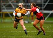 11 March 2022; Orlagh Lally of DCU Dóchas Éireann in action against Sarah Leahy of UCC during the Yoplait LGFA O'Connor Cup Semi-Final match between DCU Dóchas Éireann, Dublin and UCC, Cork at DCU in Dublin. Photo by Eóin Noonan/Sportsfile