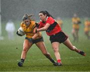 11 March 2022; Maria Reilly of DCU Dóchas Éireann in action against Jen O'Gorman of UCC during the Yoplait LGFA O'Connor Cup Semi-Final match between DCU Dóchas Éireann, Dublin and UCC, Cork at DCU in Dublin. Photo by Eóin Noonan/Sportsfile