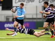 11 March 2022; Colm Kenny of St Michaels College evades the tackle of Cian Hyland of Terenure College during the Bank of Ireland Leinster Schools Junior Cup 2nd Round match between Terenure College and St Michaels College at Energia Park in Dublin. Photo by Harry Murphy/Sportsfile