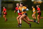 11 March 2022; Anna-Rose Kennedy of DCU Dóchas Éireann in action against Anna Carey of UCC during the Yoplait LGFA O'Connor Cup Semi-Final match between DCU Dóchas Éireann, Dublin and UCC, Cork at DCU in Dublin. Photo by Eóin Noonan/Sportsfile