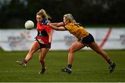 11 March 2022; Sadhbh O'Leary of UCC in action against Sarah Harding-Kenny of DCU Dóchas Éireann during the Yoplait LGFA O'Connor Cup Semi-Final match between DCU Dóchas Éireann, Dublin and UCC, Cork at DCU in Dublin. Photo by Eóin Noonan/Sportsfile